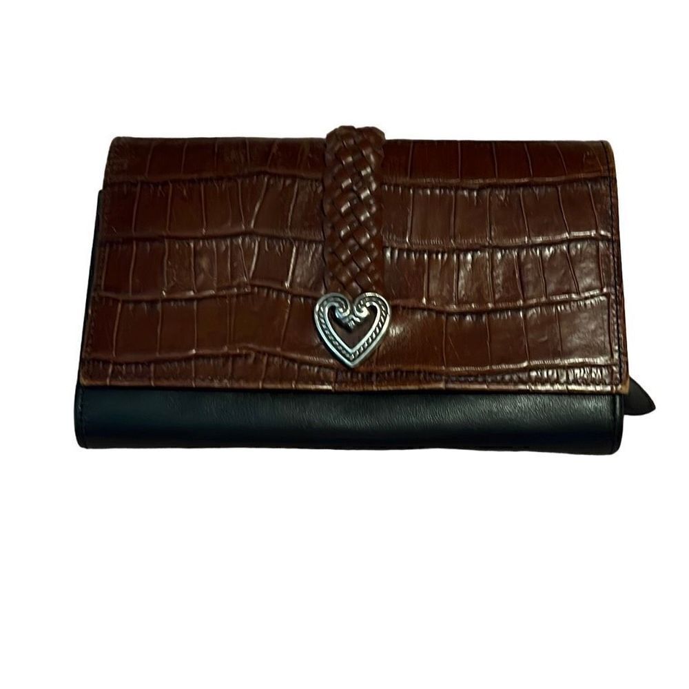 Well loved Brighton wallet. Still has a lot of life in it.